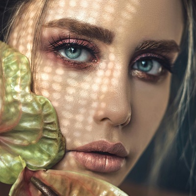 A fashion model with blue eyes.