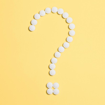 A question mark with a yellow background.