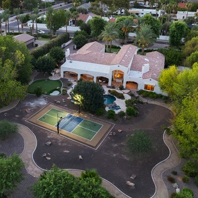The backyard of a luxury home seen from above.