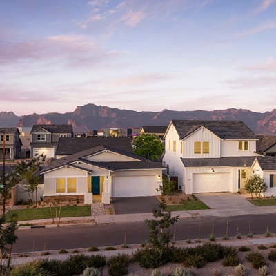 This rendering shows The Preserve at San Tan by Toll Brothers, with modern homes set against the stunning backdrop of the San Tan Mountains.