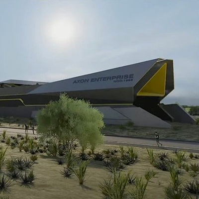 A conceptual rendering of Axon Enterprise's futuristic headquarters in North Scottsdale, showcasing modern architecture and desert landscaping.