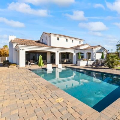 The backyard pool and backside of a custom luxury home in Scottsdale, Arizona's Cactus Corridor.