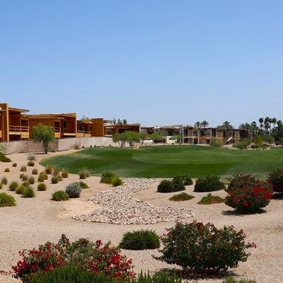 A golf course fairway in Arizona with new homes being built.