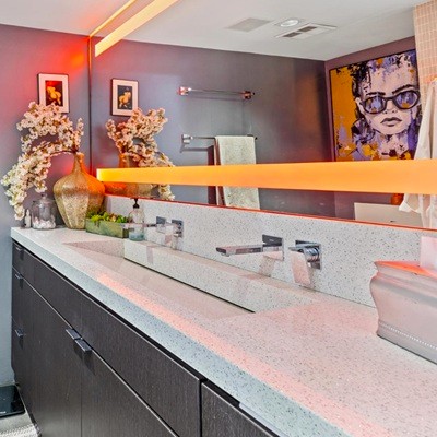 The modern bathroom of a luxury condo at Optima Camelview Village.