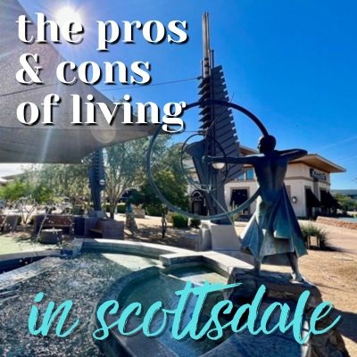 Fountain sculpture and shaded seating area at a shopping plaza in Scottsdale under a sunny sky.