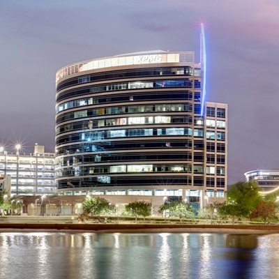 The Hayden Ferry Lakeside III building in Tempe, Arizona seen at night.