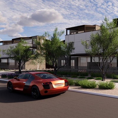 Modern three-story Vedana townhomes with rooftop decks, large windows, and sleek architecture, with a red sports car parked on the street in front.