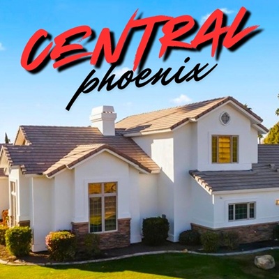 White luxury home in Central Phoenix with a modern design and landscaped yard.