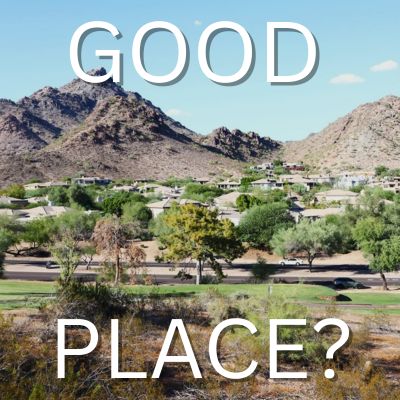 The words 'good place' written over a view of upscale homes in Paradise Valley, Arizona, tucked below the rugged slopes of the Phoenix Mountains.