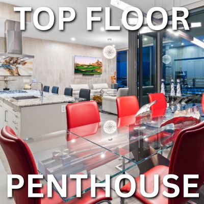 The words 'top-floor penthouse' written over a photo of a modern dining area in top-floor penthouse with red chairs and city views.