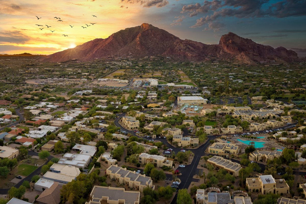 Aerial view of Paradise Valley with Camelback Mountain in the background at sunset